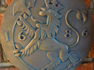 Det Norske Myntverket logo 1686